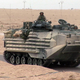 Image for article titled Watch This Amphibious Assault Vehicle Leap Off A Pier Into The Water At High Speed